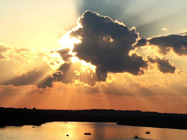 Sun Behind Storm Cloud SkySpy Photos, Images, Video